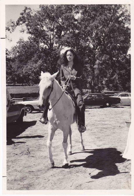 VERONICA ALI RIDING HER HORSE